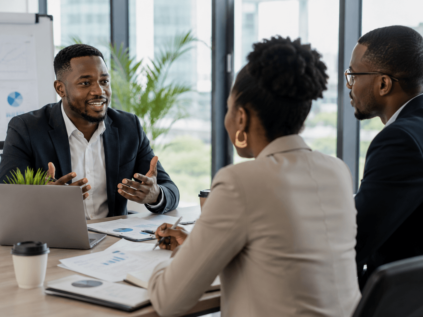 Professionals in a business meeting conducted in English